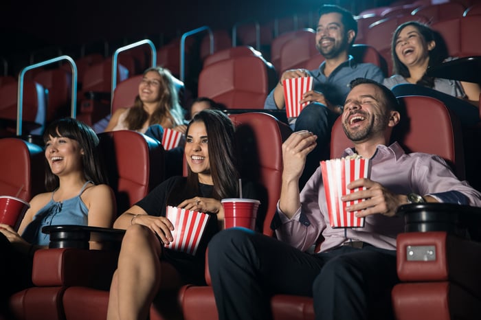 People watching a movie at a theater