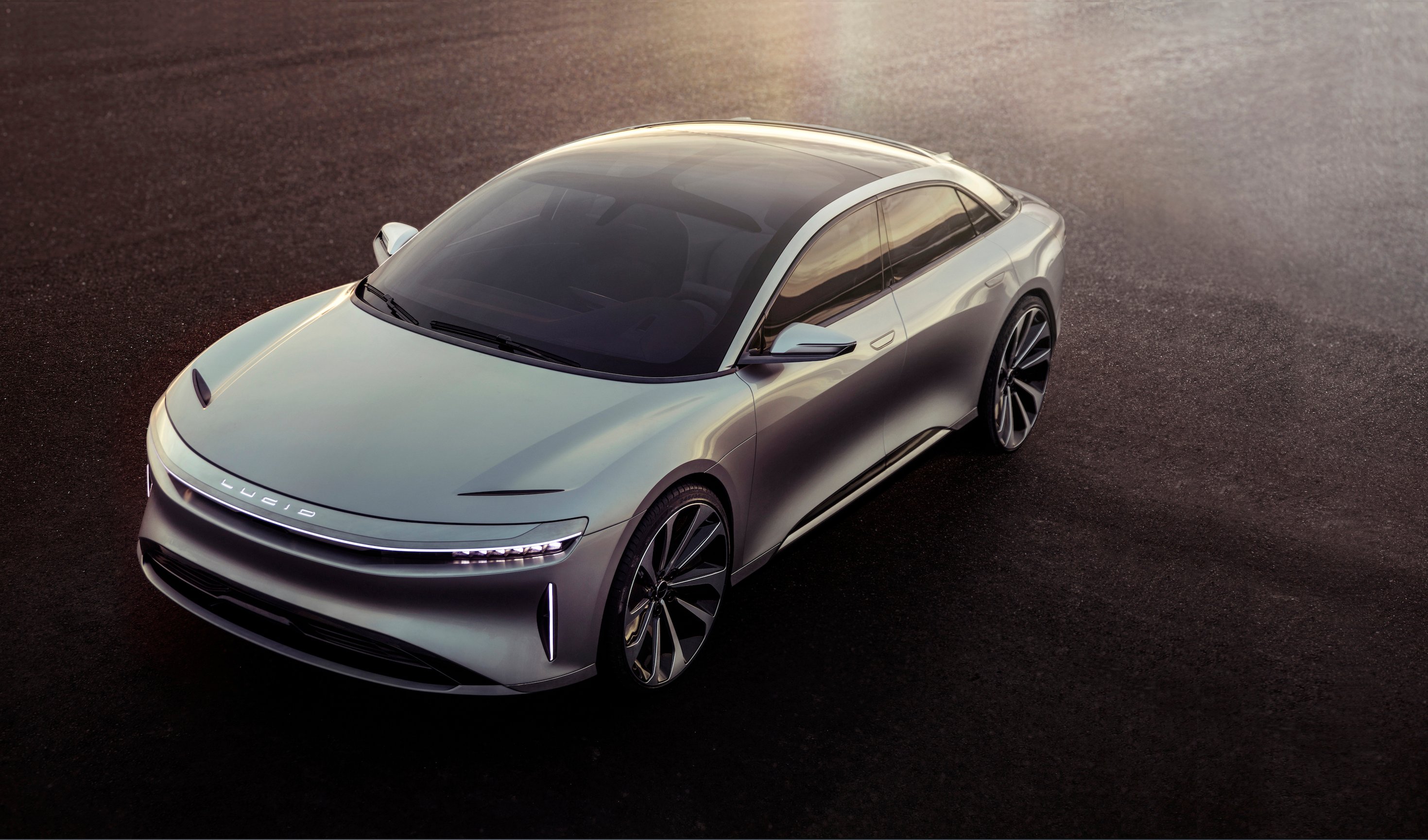 The Lucid Air prototype, a sleek silver full-size luxury sedan. 