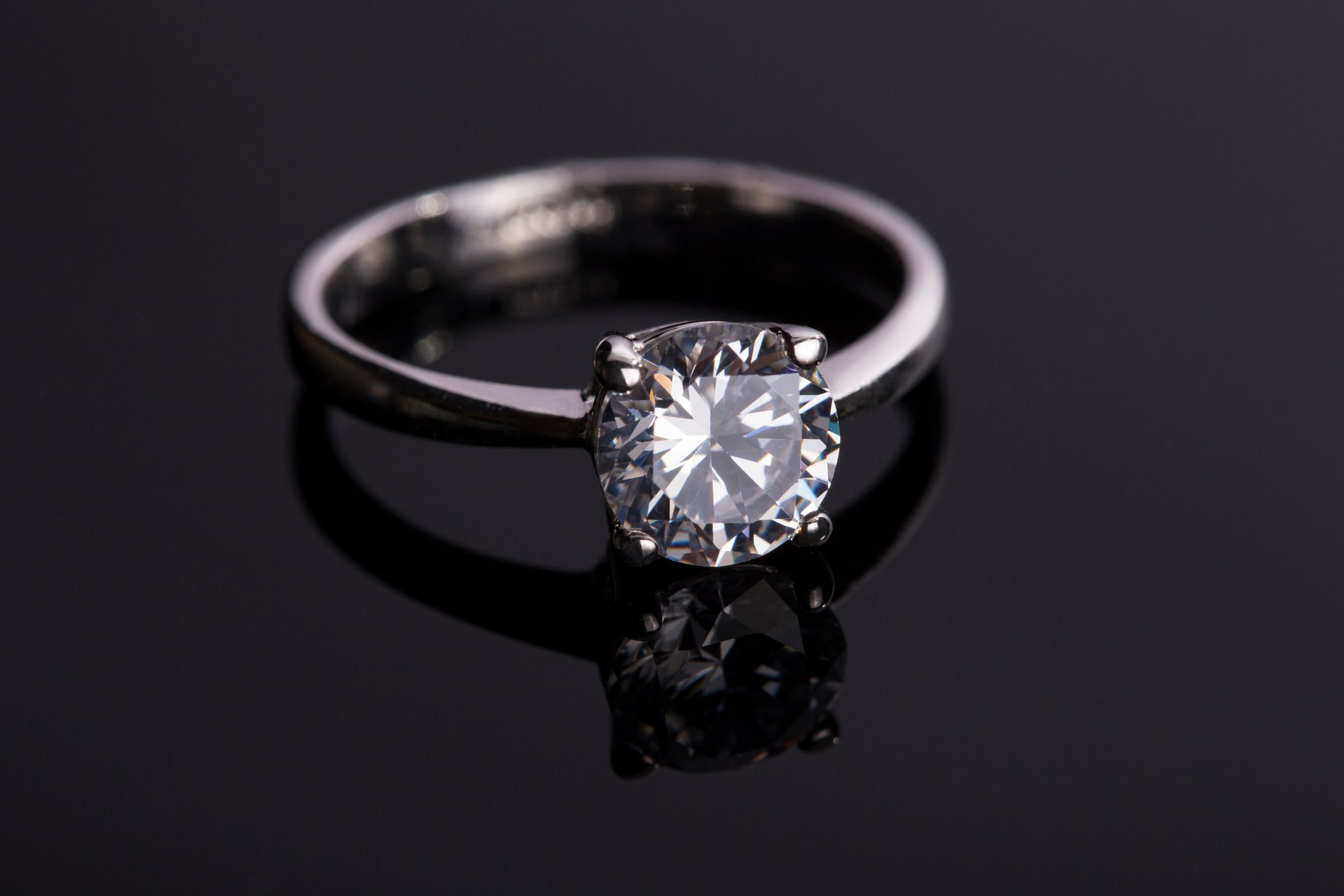 A solitaire diamond ring.