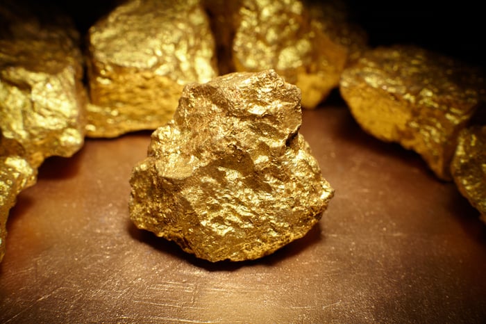 Gold nuggets arranged in a circle.