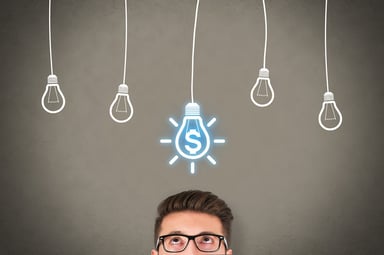 Man with lightbulb money idea