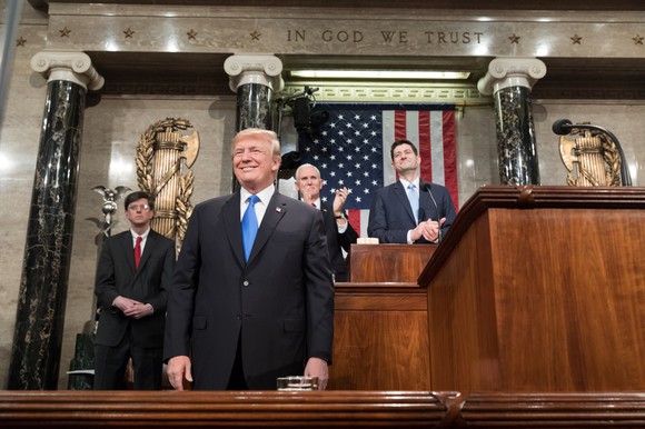 President Trump smiling before giving the State of the Union address in Congress.