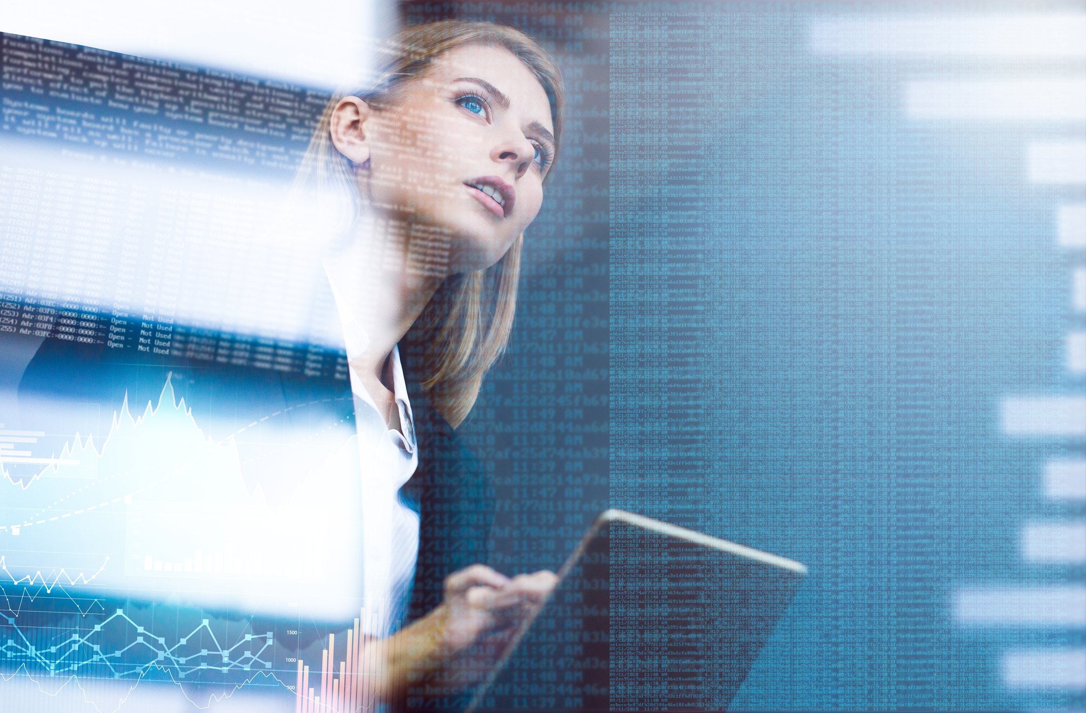 Woman holding laptop with superimposed lines of code; software programming concept.