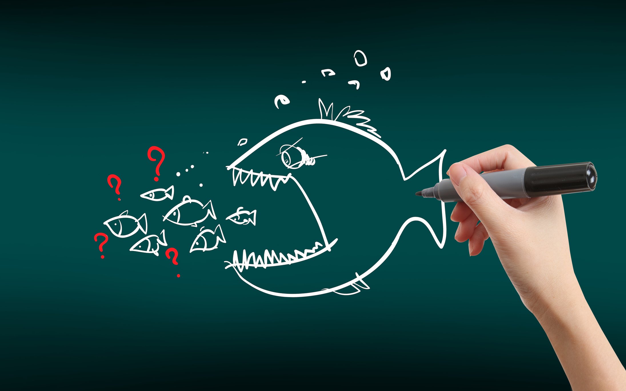 A drawing of a big fish eating many smaller fish.