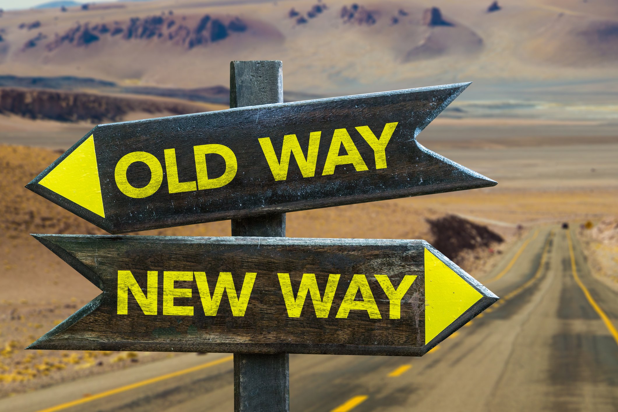 Two black arrows with yellow letters saying Old Way and New Way.