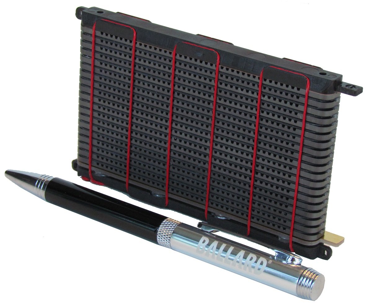 Black and red fuel cell next to a pen with the Ballard logo on it.