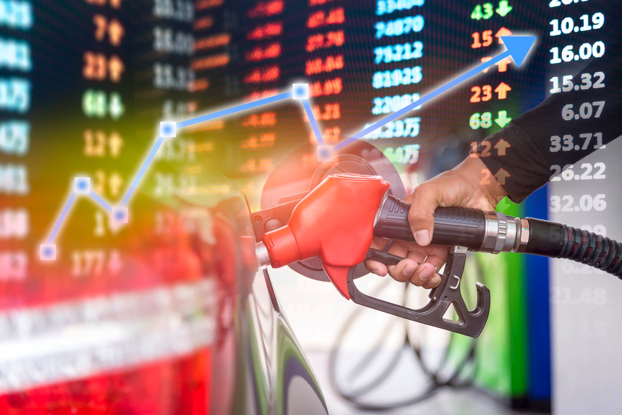 Red gas pump superimposed over a stock chart with a blue arrow going up.