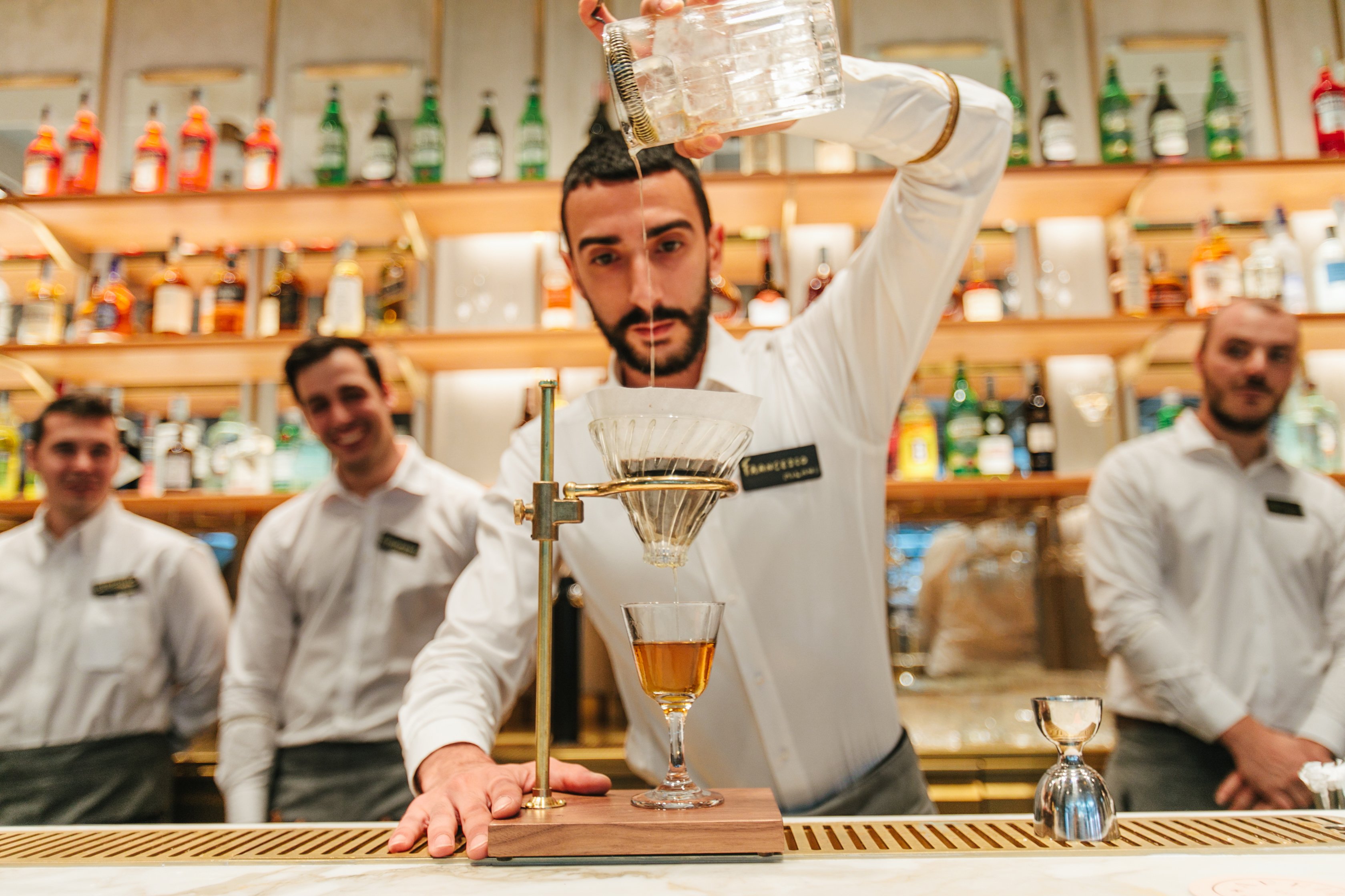A bartender prepares a cocktail at the Roastery bar.
