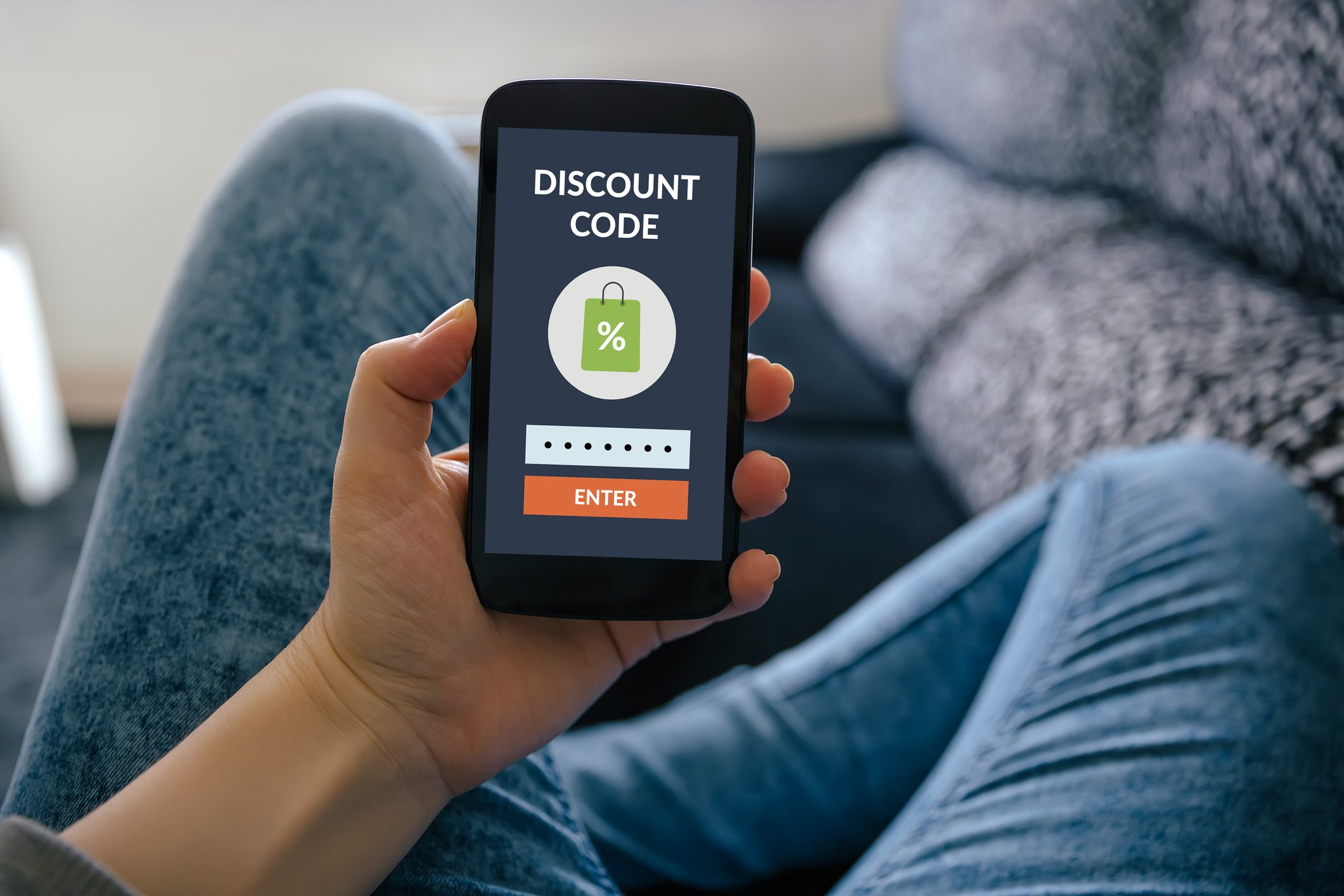 View of a smartphone screen saying "Discount Code."