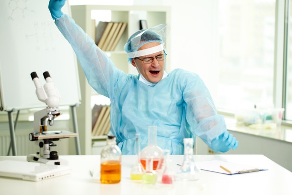 Yawning scientist in lab