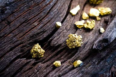 Gold Nuggets On Wood