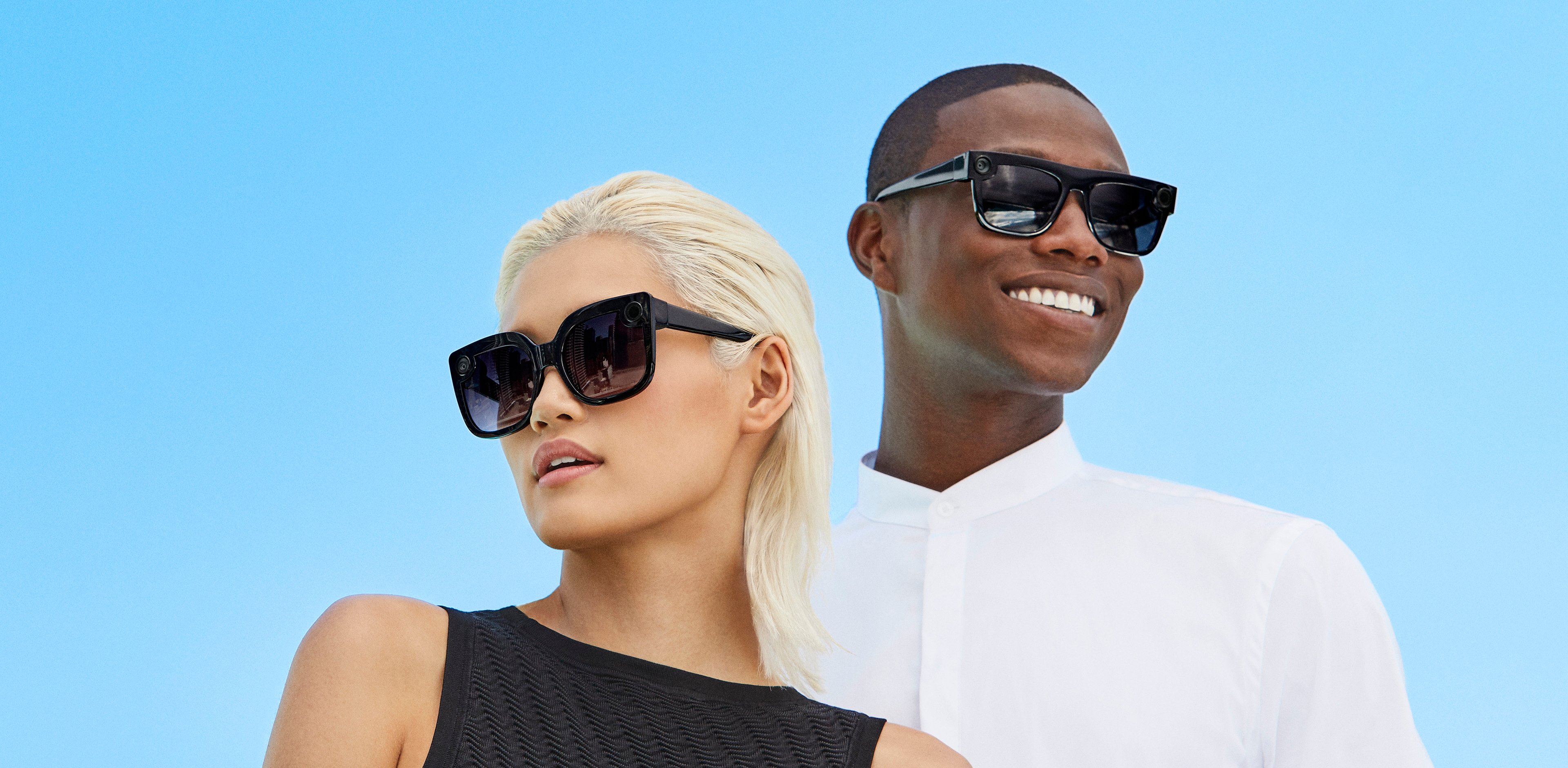 Man and woman wearing the new Spectacles styles