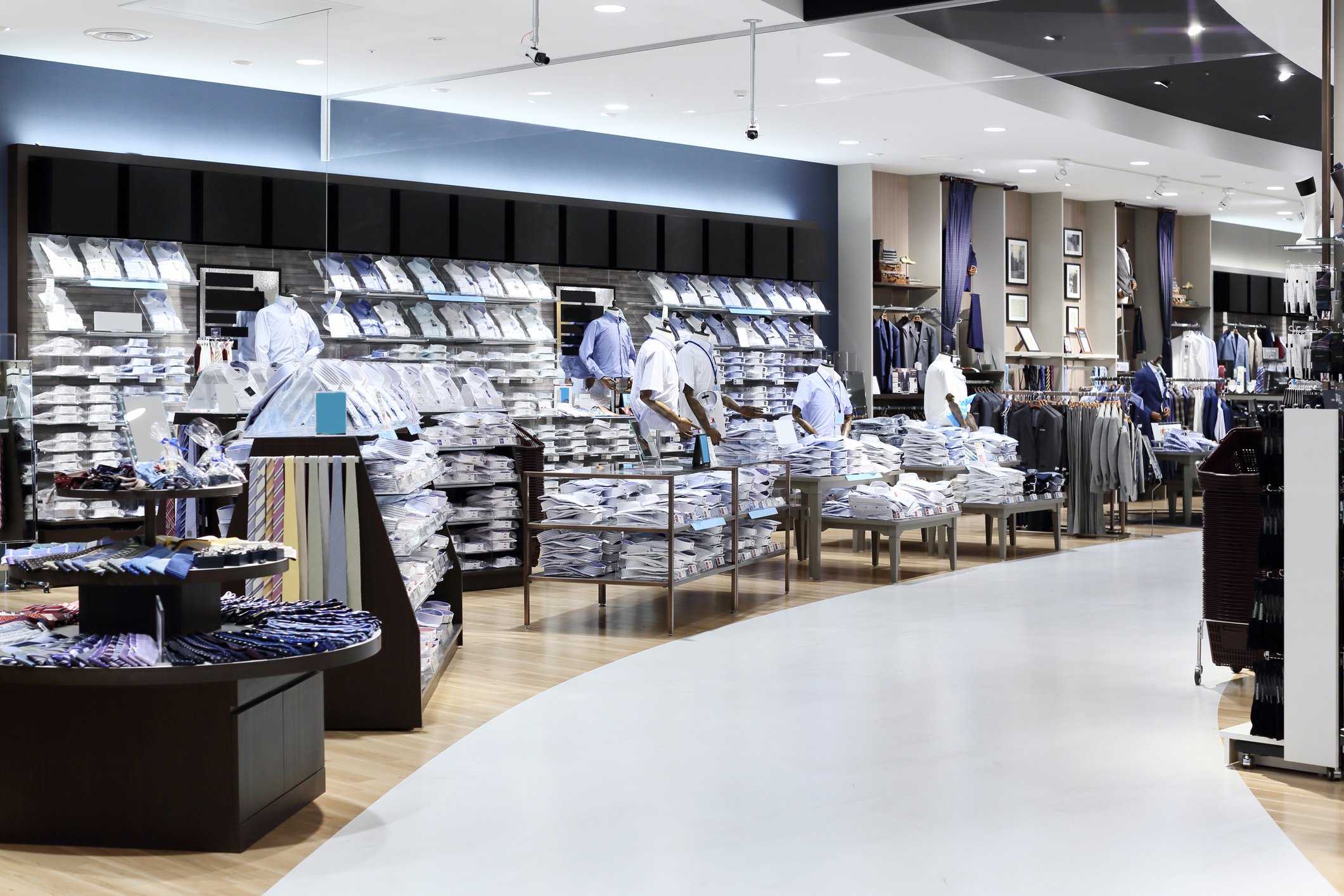 Men's clothing displays in a department store.