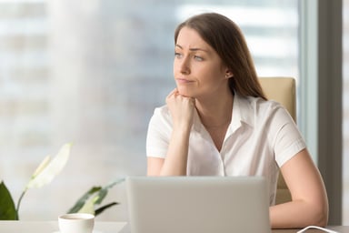 bored woman at laptop_GettyImages-828110556