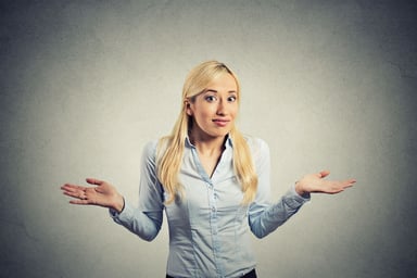 woman shrugging confused uncertain