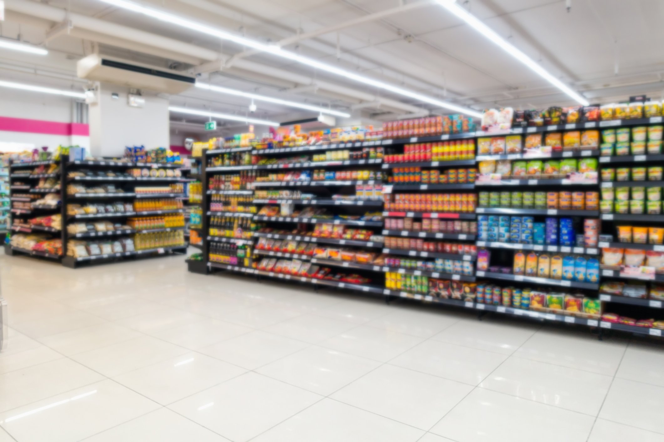 A blurred image of supermarket shelves