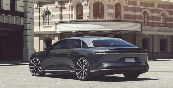 A gray Lucid Air, a sleek and low-slung full-size sedan.