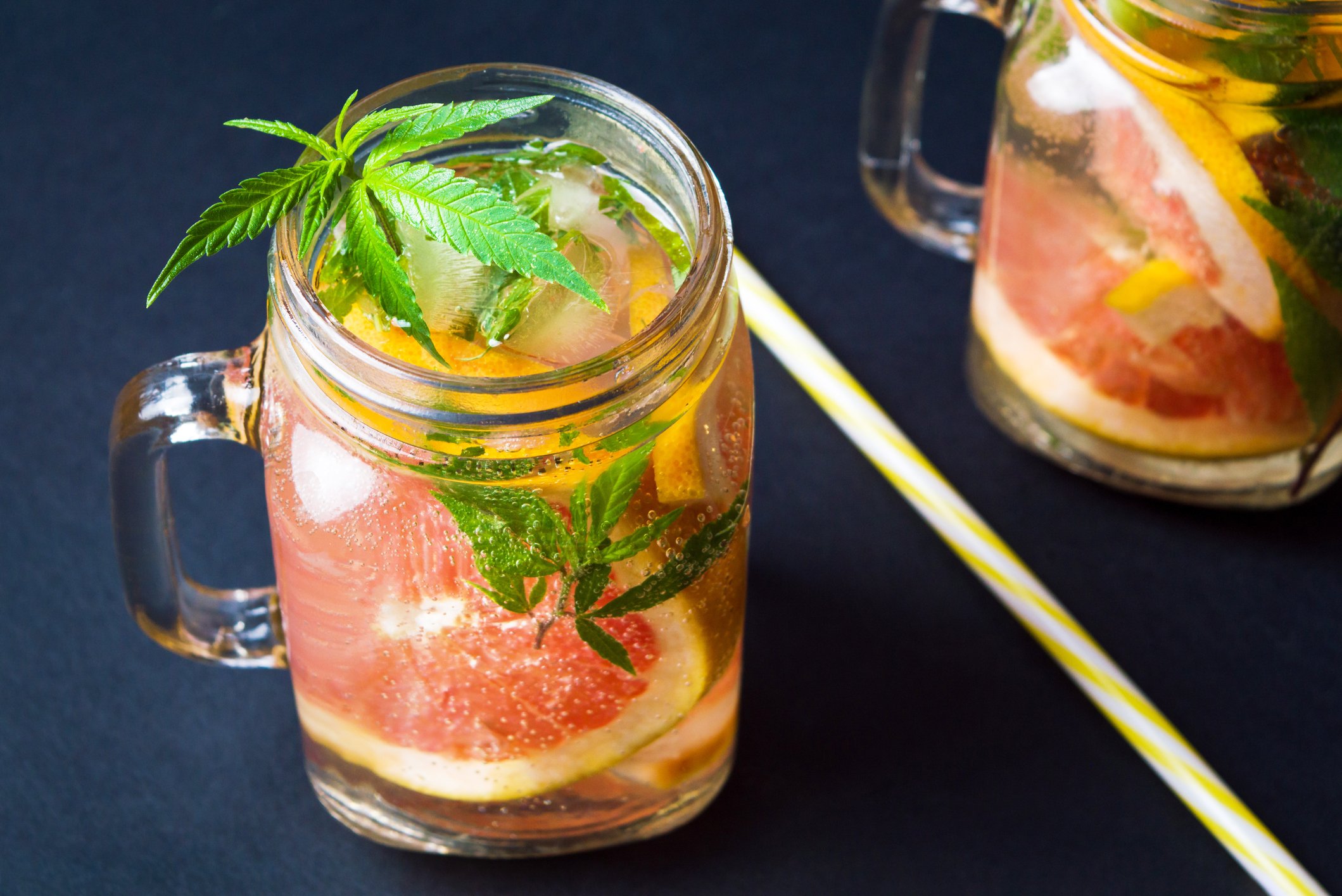Marijuana leaves in a grapefruit drink.