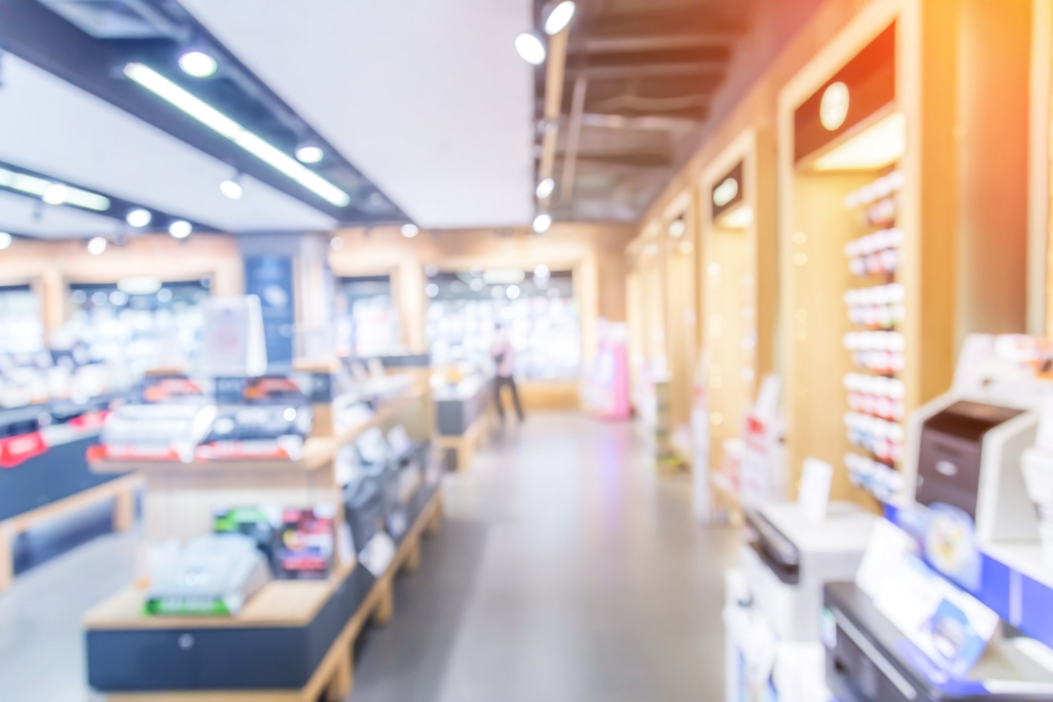 A blurry image of a supermarket.