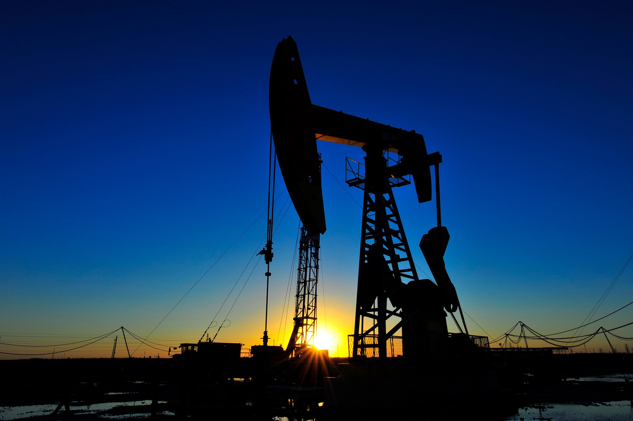 An oil pump at sunrise.