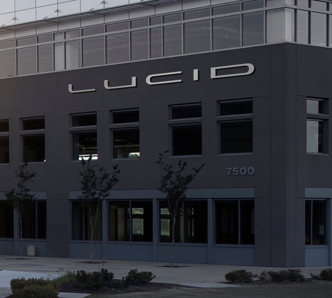 A close-up of the "LUCID" logo on the front of an office building.
