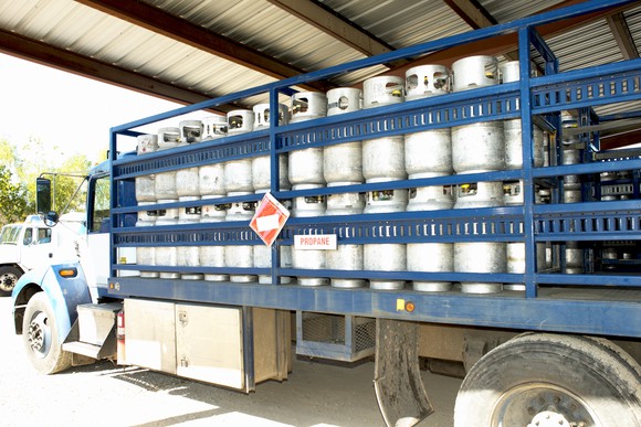 A truck carrying propane cylinders