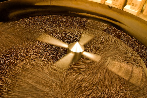 A machine mixes beans at an Ethical Bean coffee plant.