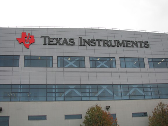 A building with the Texas Instruments corporate logo displayed.