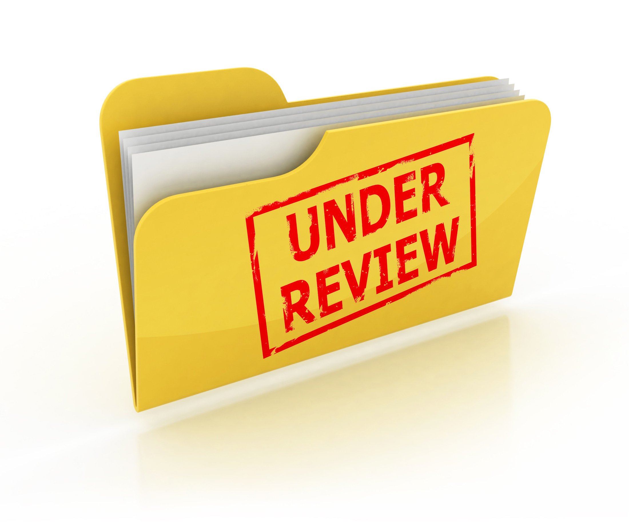 Yellow folder with under review stamped on it