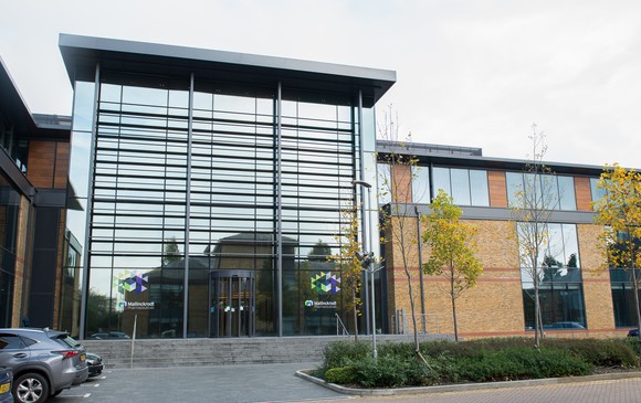 Modern building with Mallinckrodt logos on windows.
