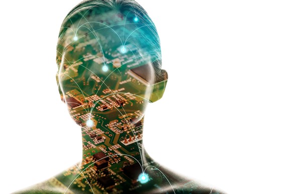 Silhouette of woman's head with computer motherboard overlaid on top.