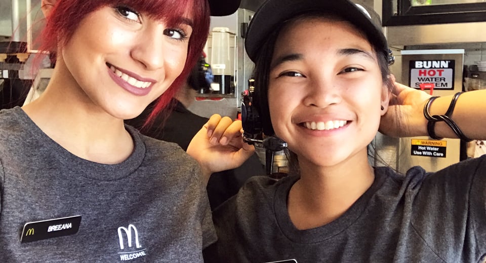 Two smiling female McDonald's employees