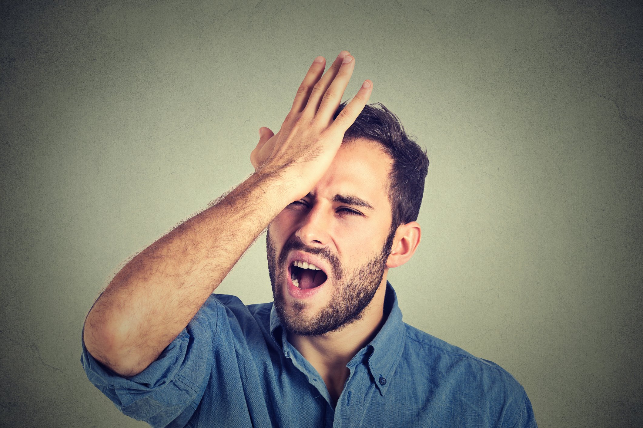 Man hitting forehead with palm.