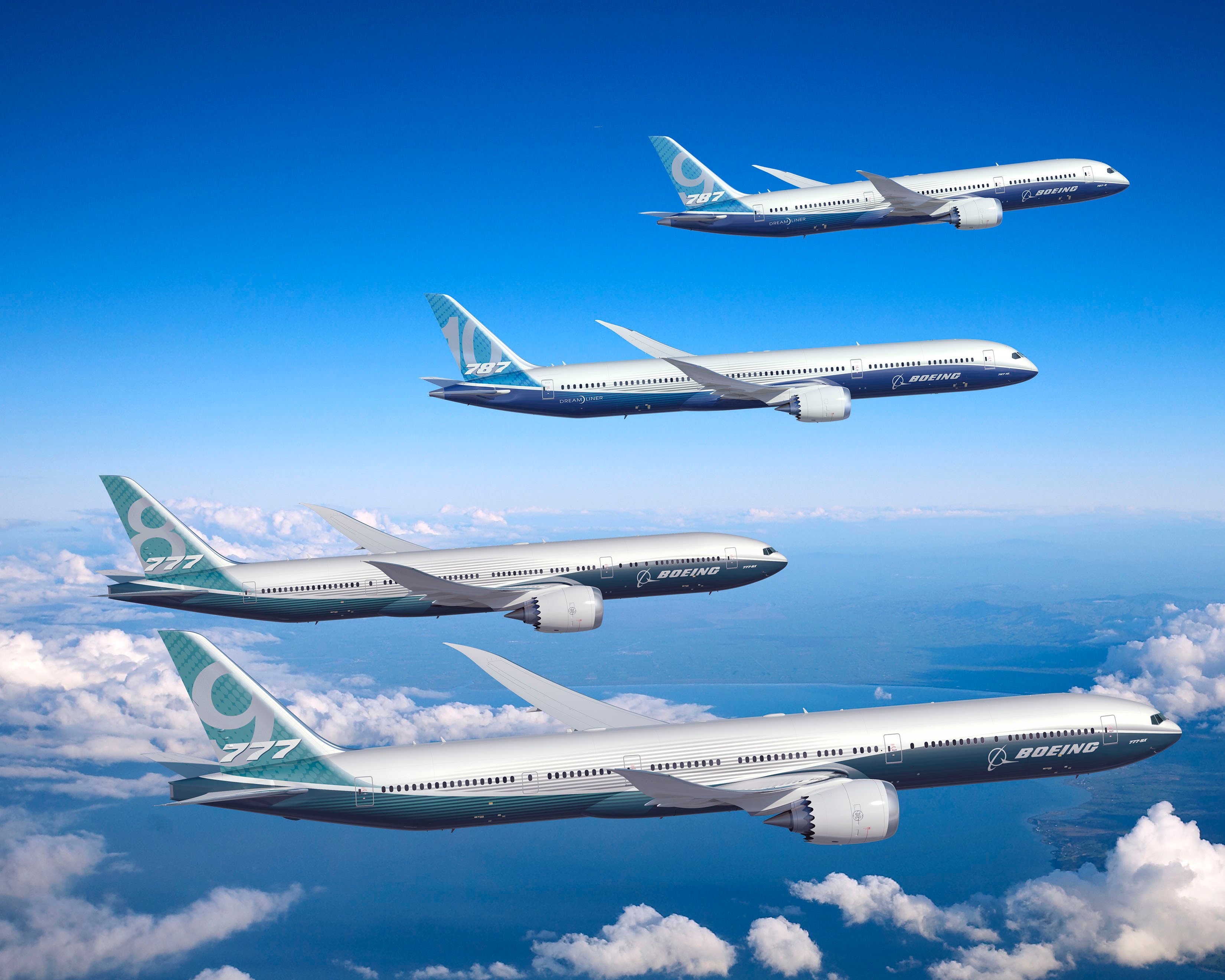 Boeing 777 and 787 twin-aisle planes in flight.