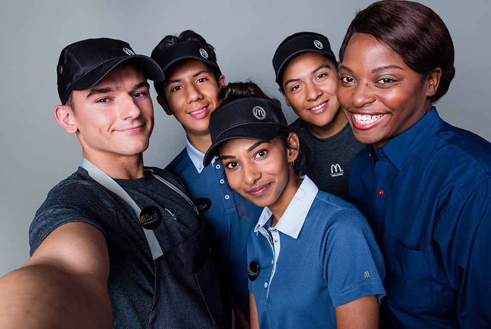 Smiling McDonald's employees.