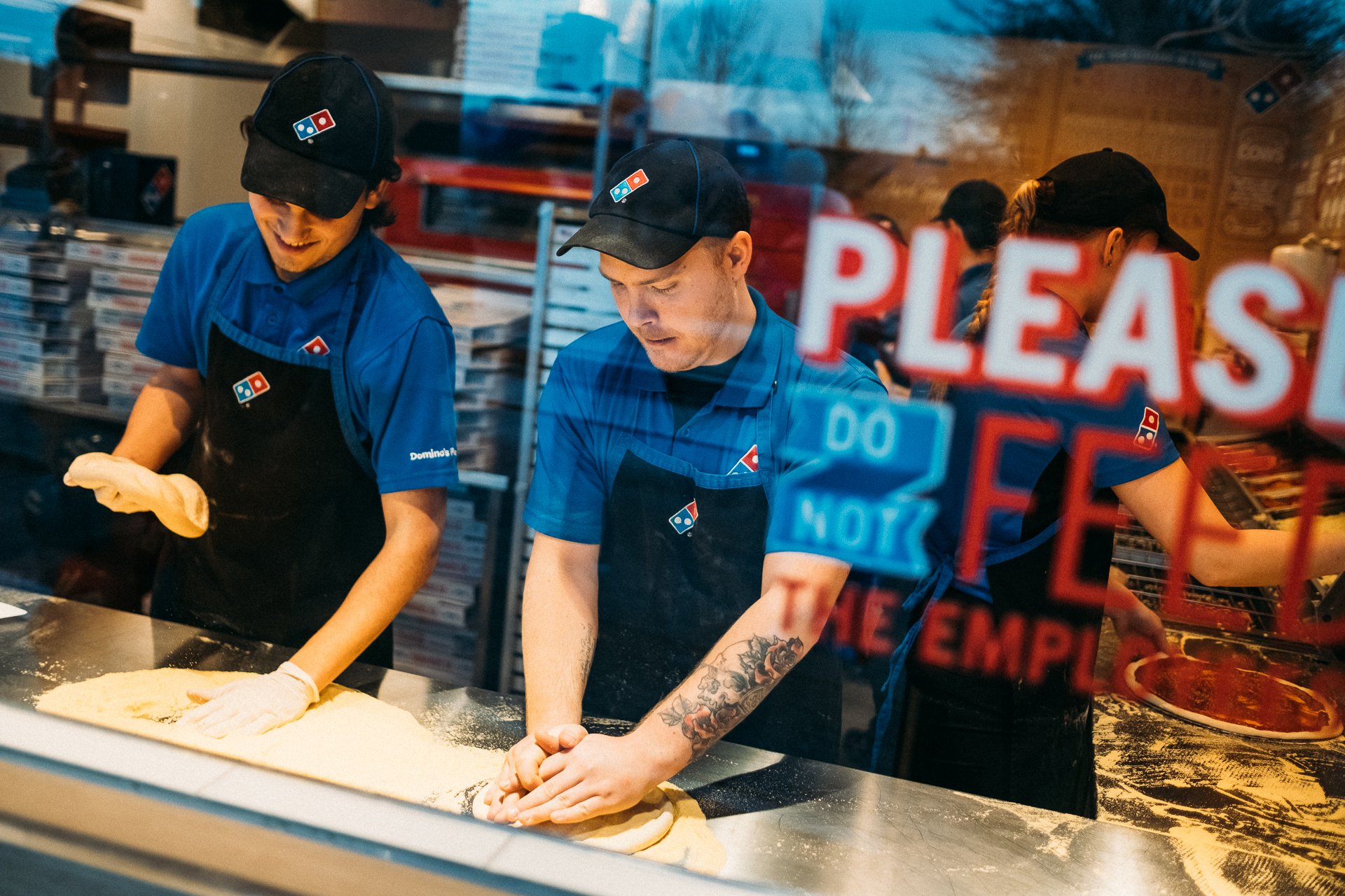 Two Domino's Pizza employees.
