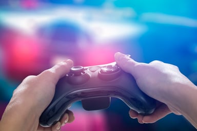 Person Holding Video Game Controller