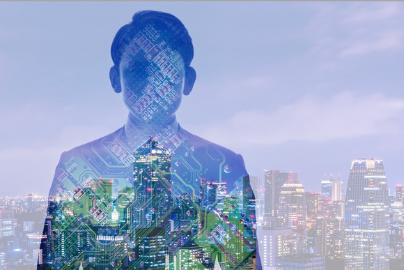 Image of man with computer motherboard superimposed on top, with city in background. 