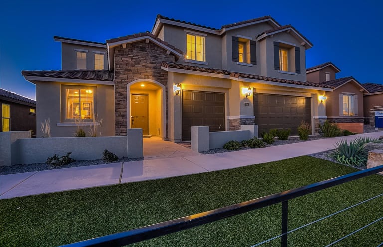 A new house lit up at night.