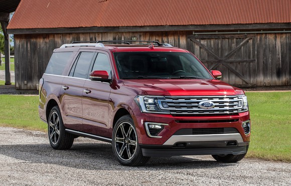 A red 2019 Ford Expedition, a big SUV.