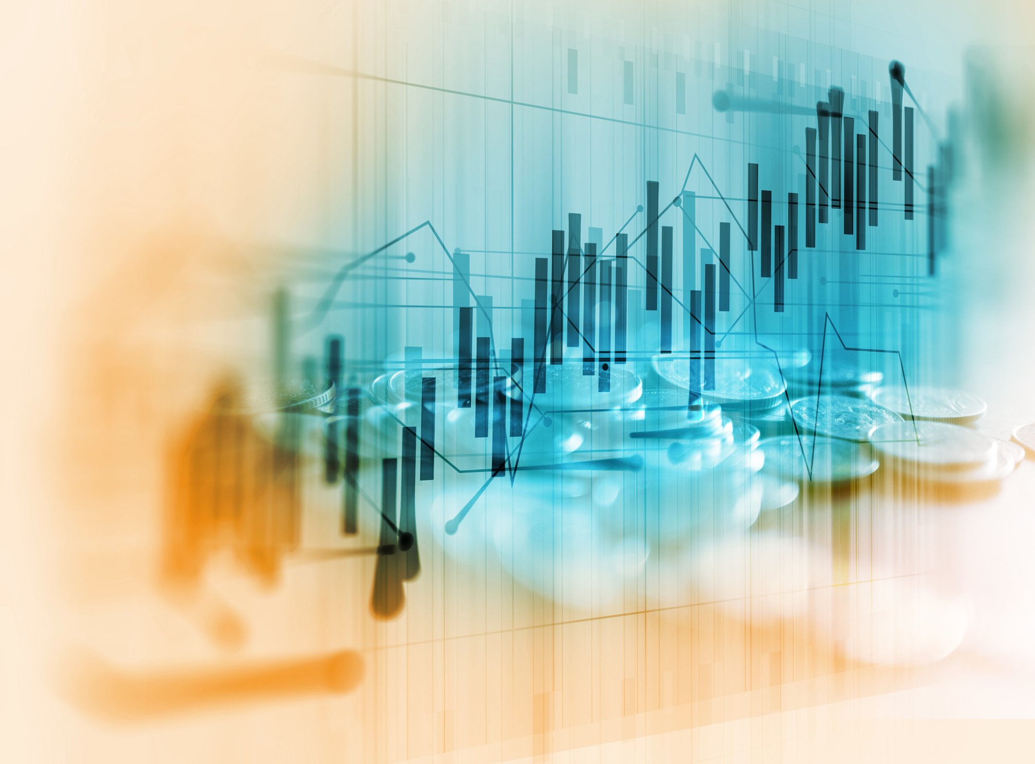 Rising graph and pile of coins.