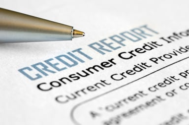credit report with pen