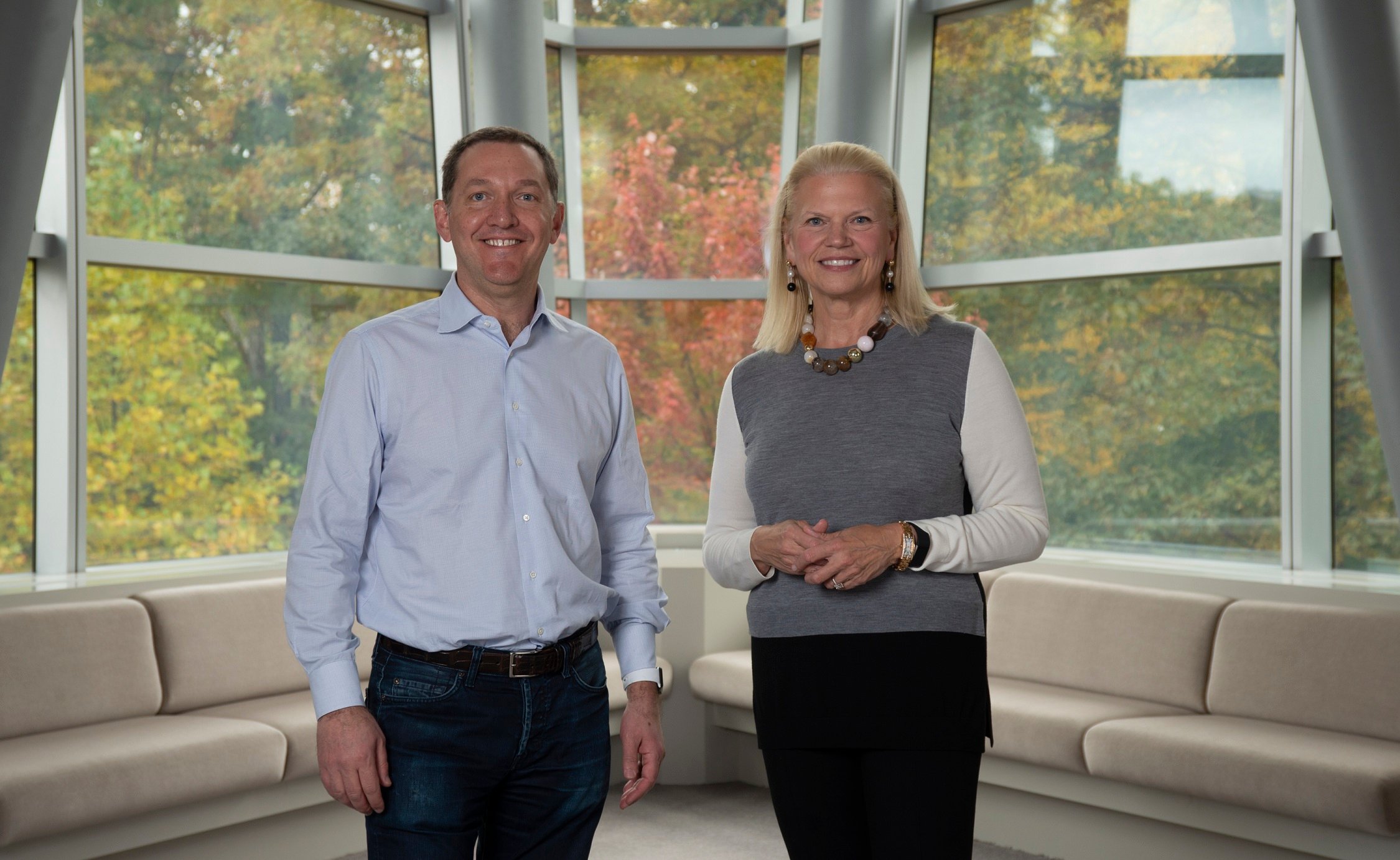 Red Hat CEO Jim Whitehurst on the left, IBM CEO Ginni Rometty on the right.