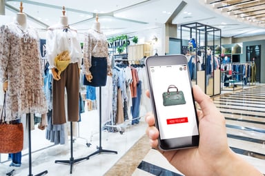 shopper-using-phone-in-mall