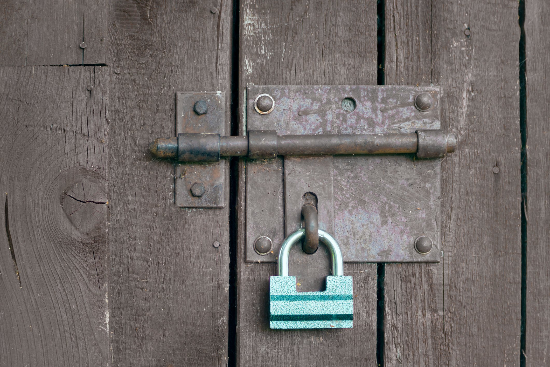 A lock on a wooden door