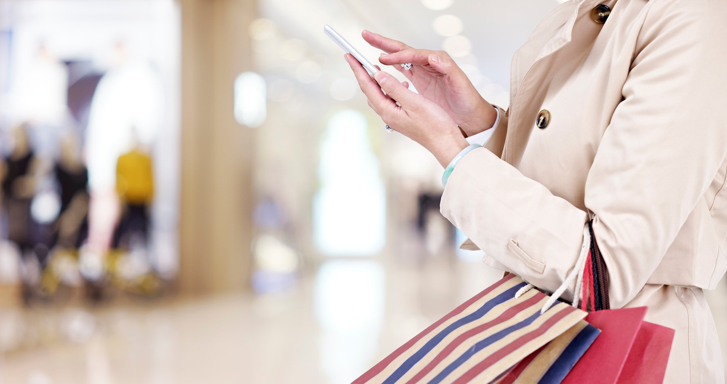 A woman using a mobile phone.