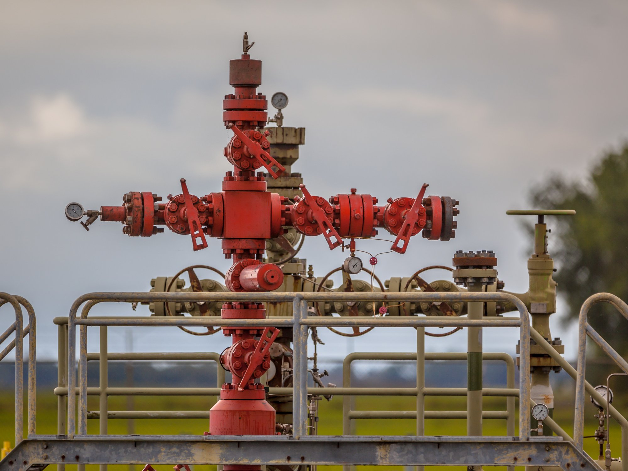 A red natural gas wellhead
