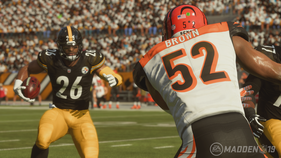 Screenshot of Madden NFL video game depicting two football players in action during a game.