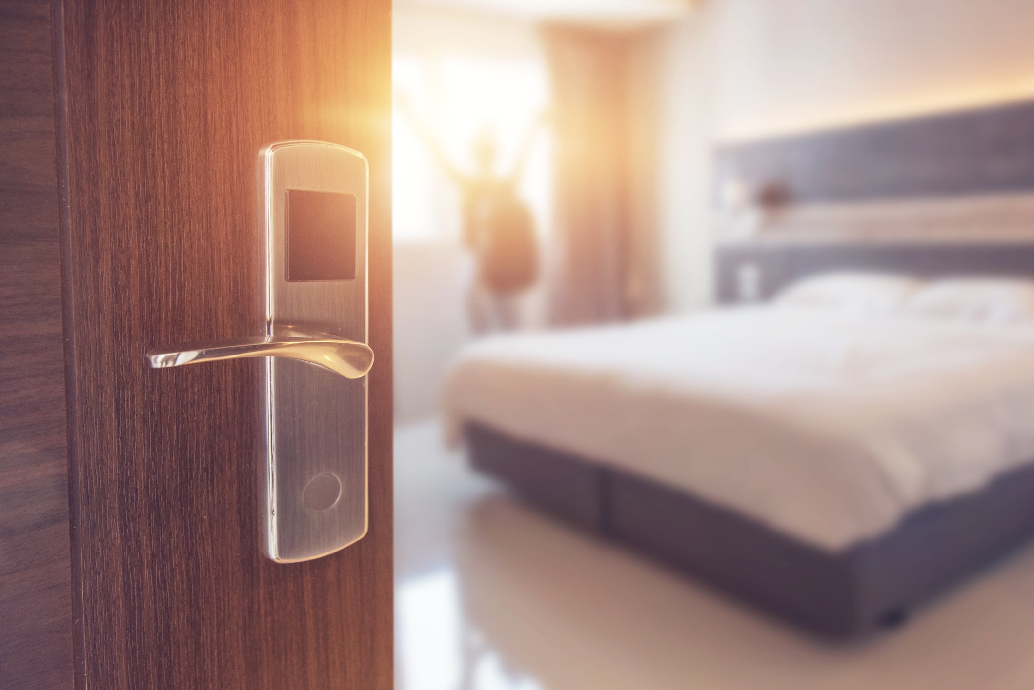 Door opening into hotel room. 