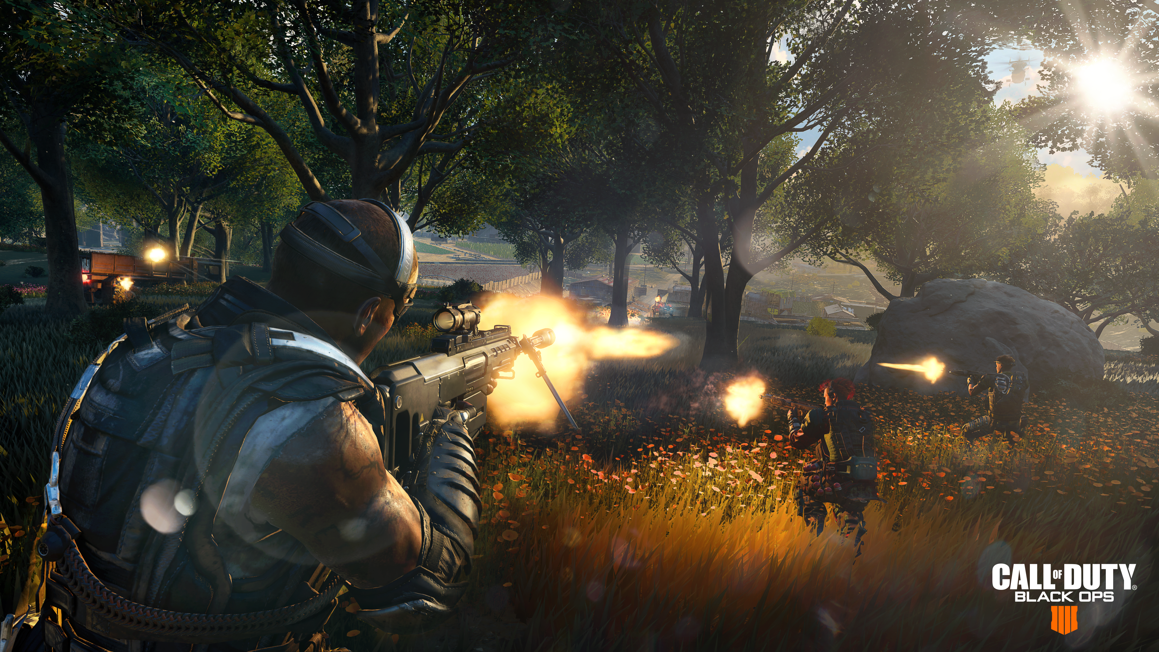 A screenshot from Activision's "Call of Duty: Black Ops 4: Blackout," with video game characters firing at distant foes.